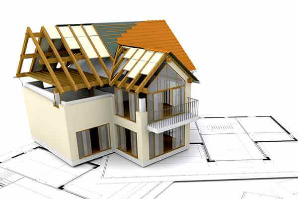 Help to Buy Scheme 3D Building model with architect plans on tabletop.